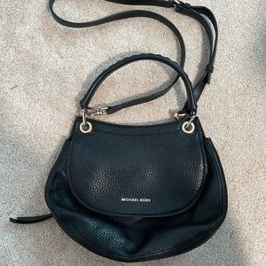 Michael kors handbag made from genuine leather